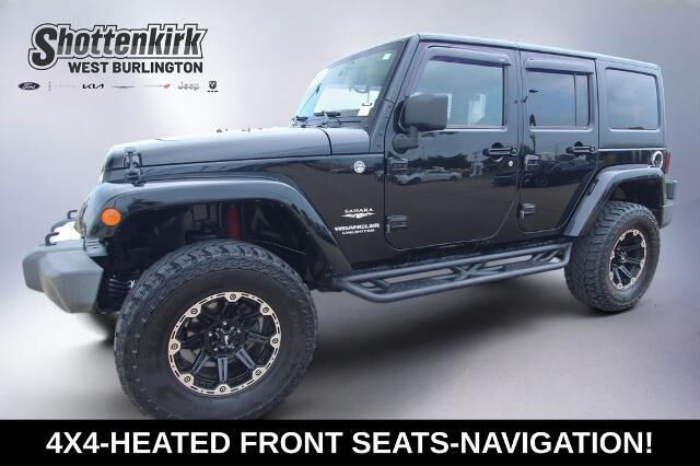 2013 Jeep Wrangler Unlimited Sahara — photo 1 of 26
