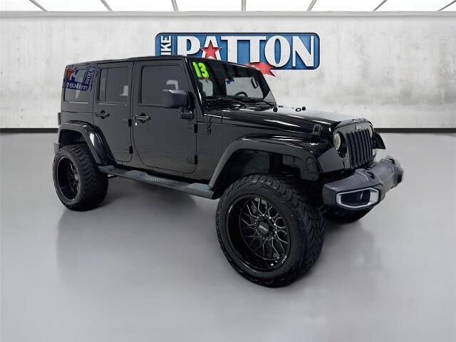 2013 Jeep Wrangler Unlimited Sahara — photo 1 of 26