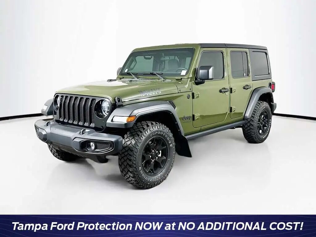 2022 Jeep Wrangler Unlimited Sport — photo 1 of 14