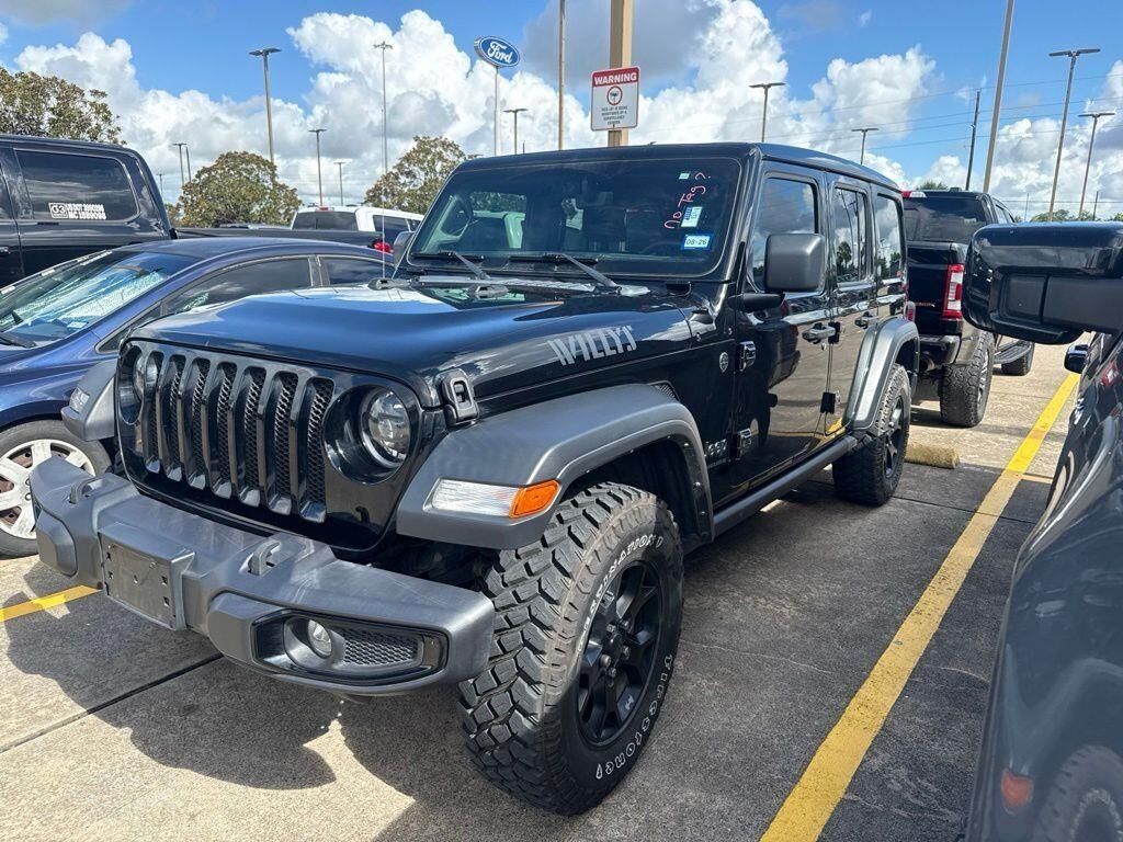 2023 Jeep Wrangler Sport — photo 1 of 6