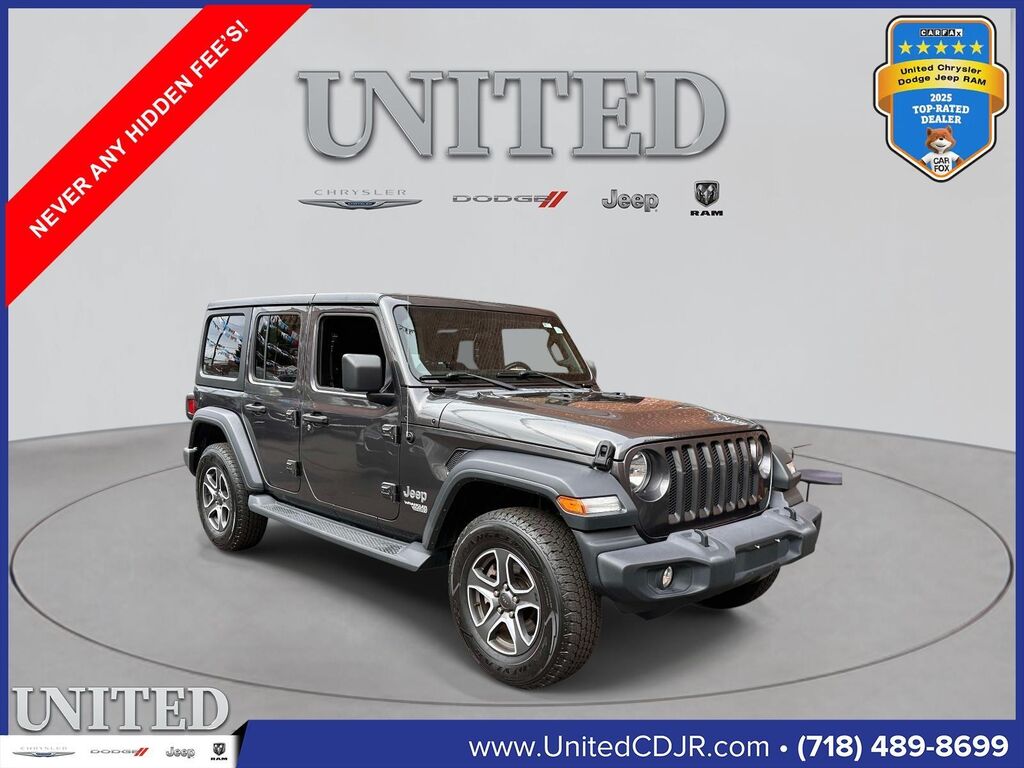 2020 Jeep Wrangler Unlimited Black and Tan — photo 1 of 25