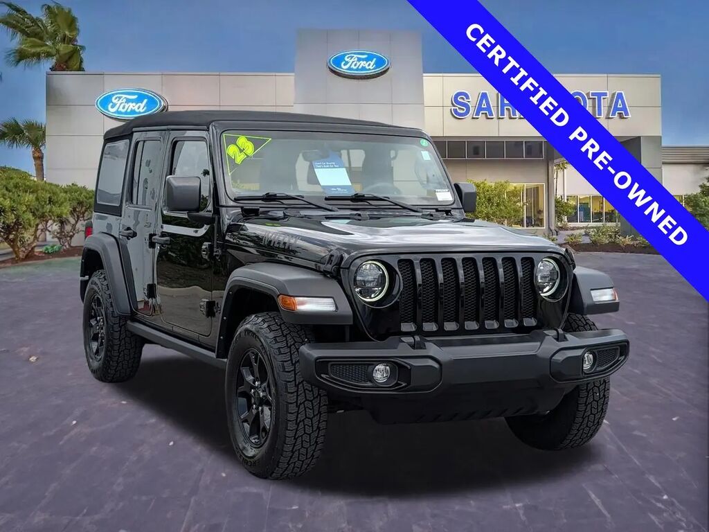 2023 Jeep Wrangler Sport — photo 1 of 13