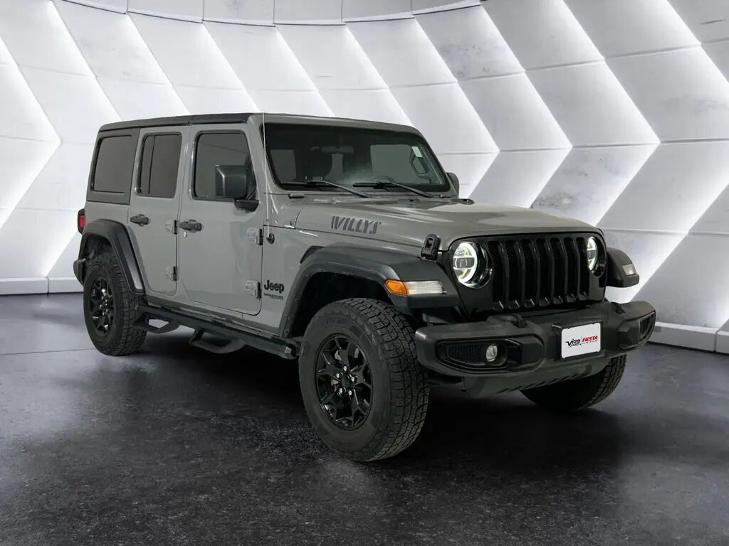 2021 Jeep Wrangler Unlimited Sport — photo 1 of 13