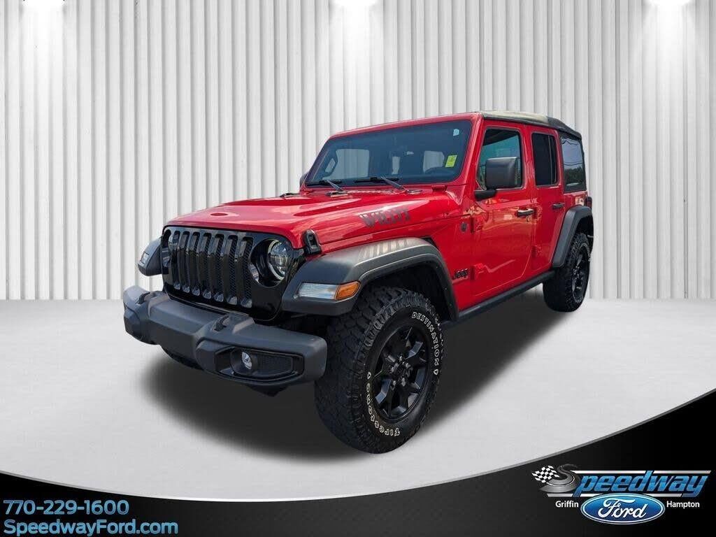 2023 Jeep Wrangler Sport — photo 1 of 14