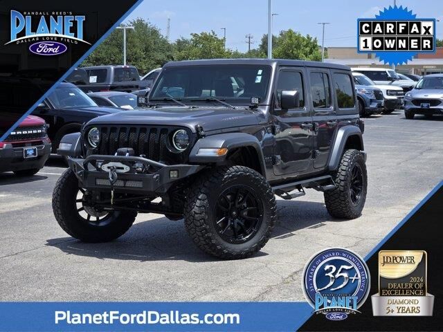 2023 Jeep Wrangler Sport — photo 1 of 14