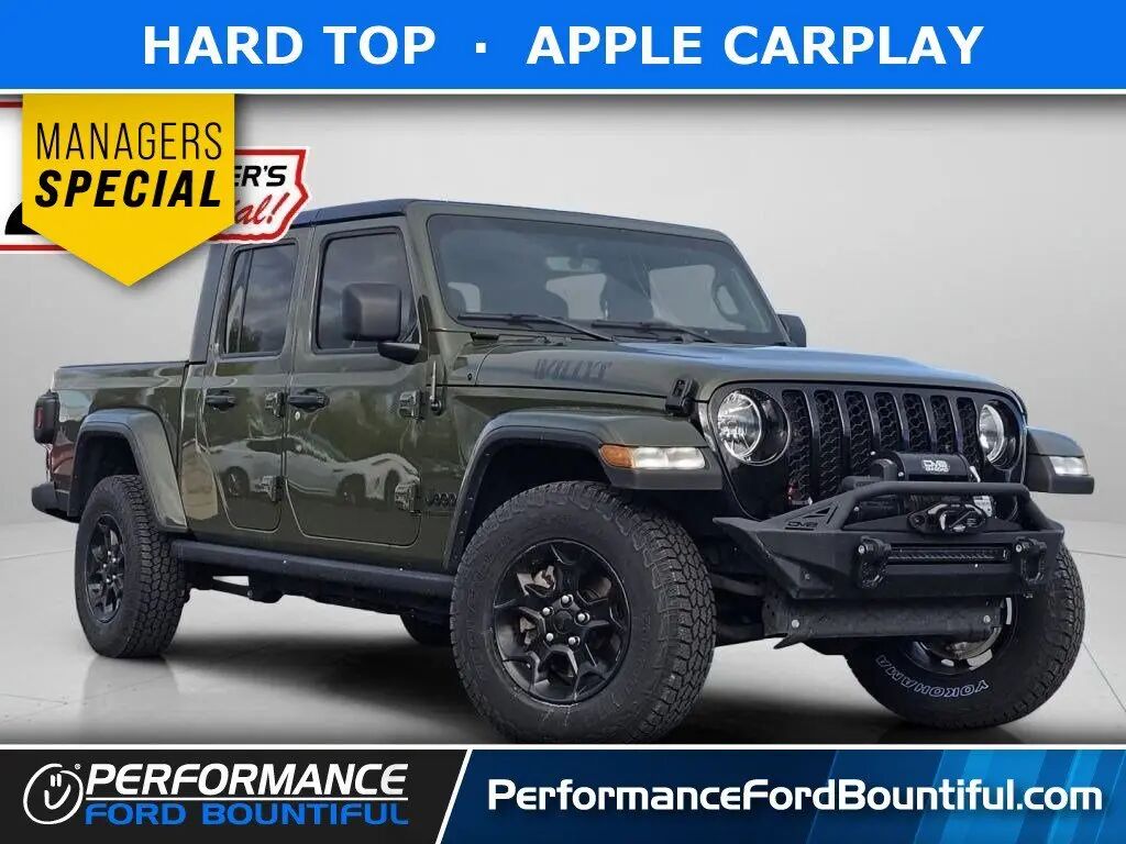 2023 Jeep Gladiator Sport — photo 1 of 38