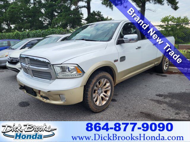 2015 Ram 1500 4WD Crew Cab 149" Laramie Long — photo 1 of 10