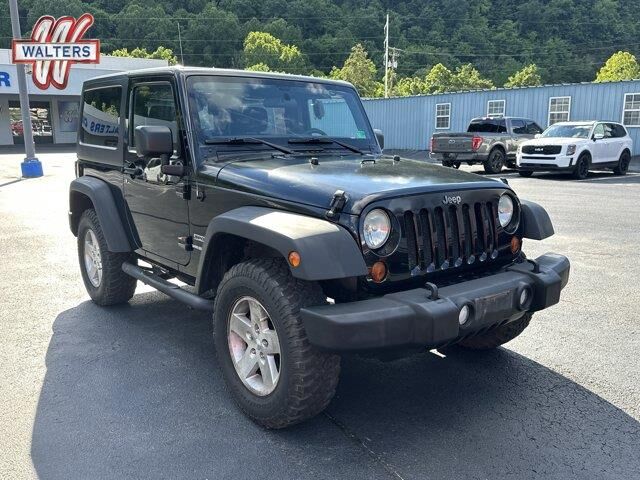 2011 Jeep Wrangler Sport Mojave — photo 1 of 39