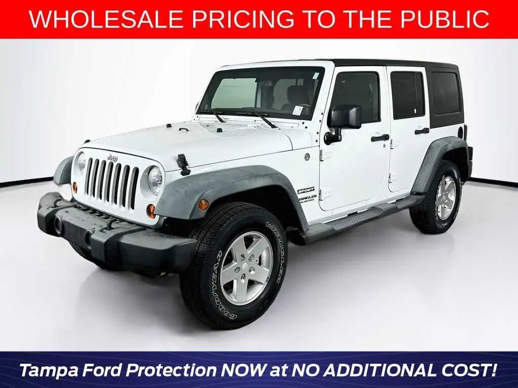 2011 Jeep Wrangler Unlimited Sport — photo 1 of 13