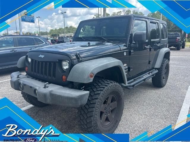 2011 Jeep Wrangler Unlimited Sport — photo 1 of 10