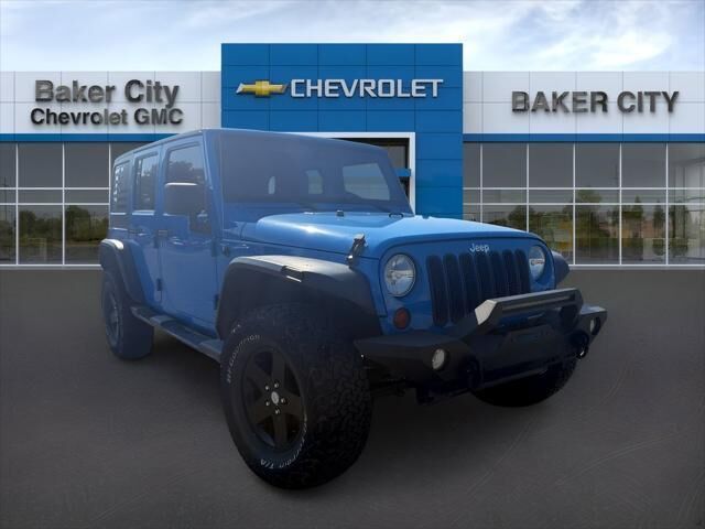 2011 Jeep Wrangler Unlimited Sport — photo 1 of 14
