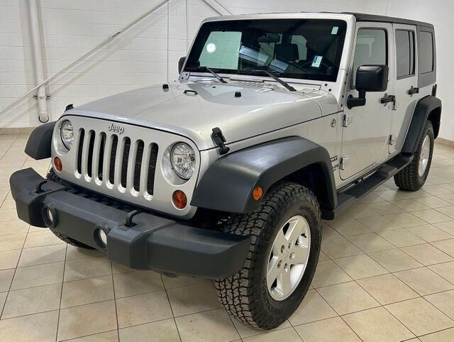 2010 Jeep Wrangler Unlimited Sport — photo 1 of 13