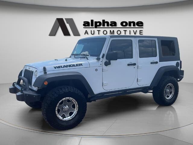 2011 Jeep Wrangler Unlimited Sport — photo 1 of 26