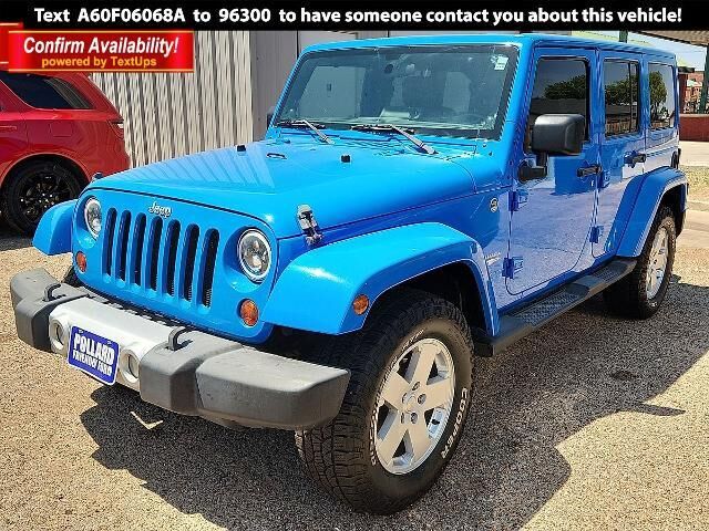 2011 Jeep Wrangler Unlimited Sahara — photo 1 of 24