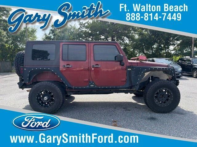 2010 Jeep Wrangler Unlimited Sahara — photo 1 of 26