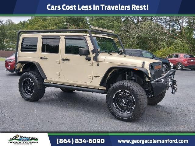 2011 Jeep Wrangler Unlimited Sahara — photo 1 of 26