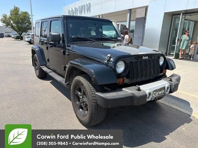2010 Jeep Wrangler Unlimited Sahara — photo 1 of 12