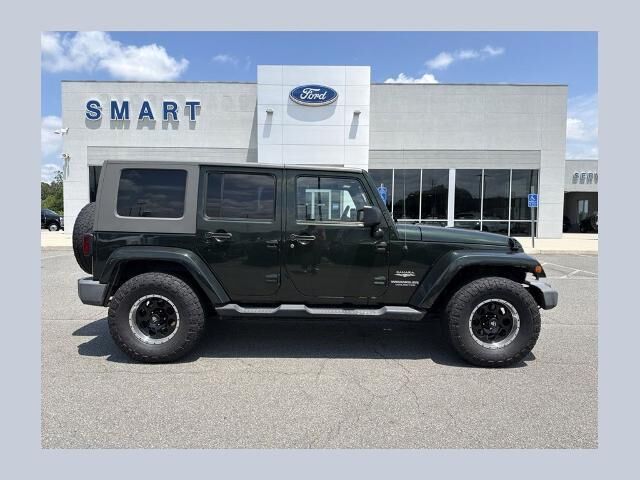 2010 Jeep Wrangler Unlimited Sahara — photo 1 of 13