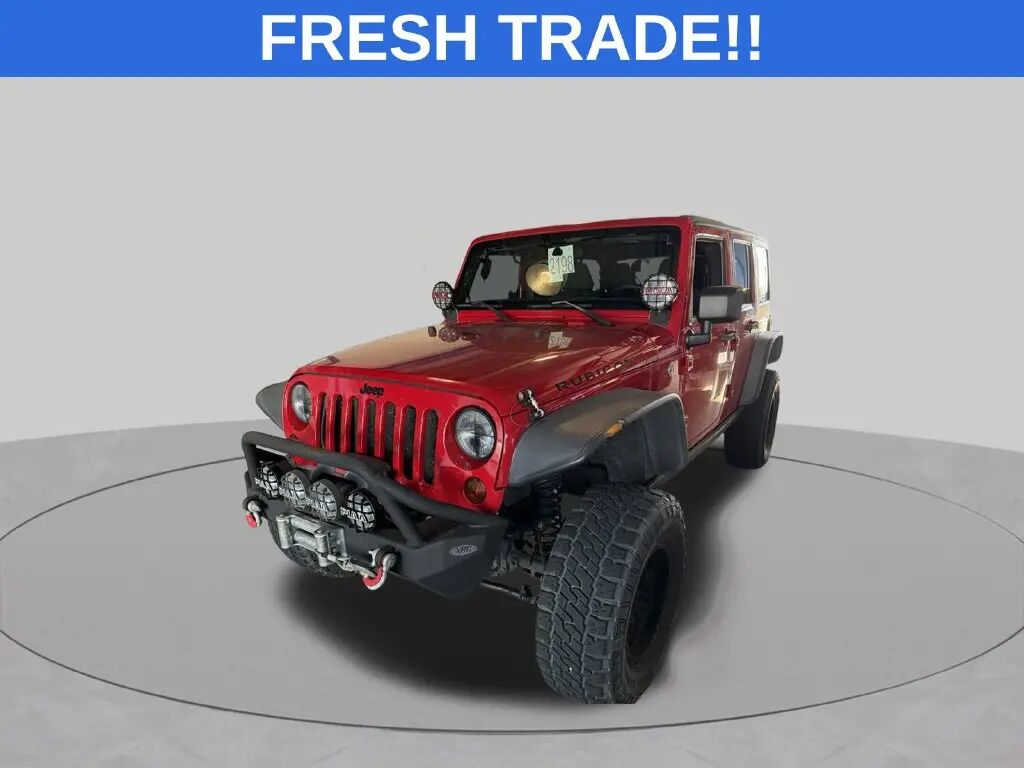 2011 Jeep Wrangler Unlimited Rubicon — photo 1 of 3