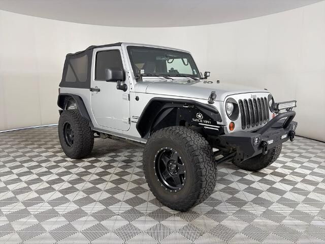 2011 Jeep Wrangler Sport — photo 1 of 26
