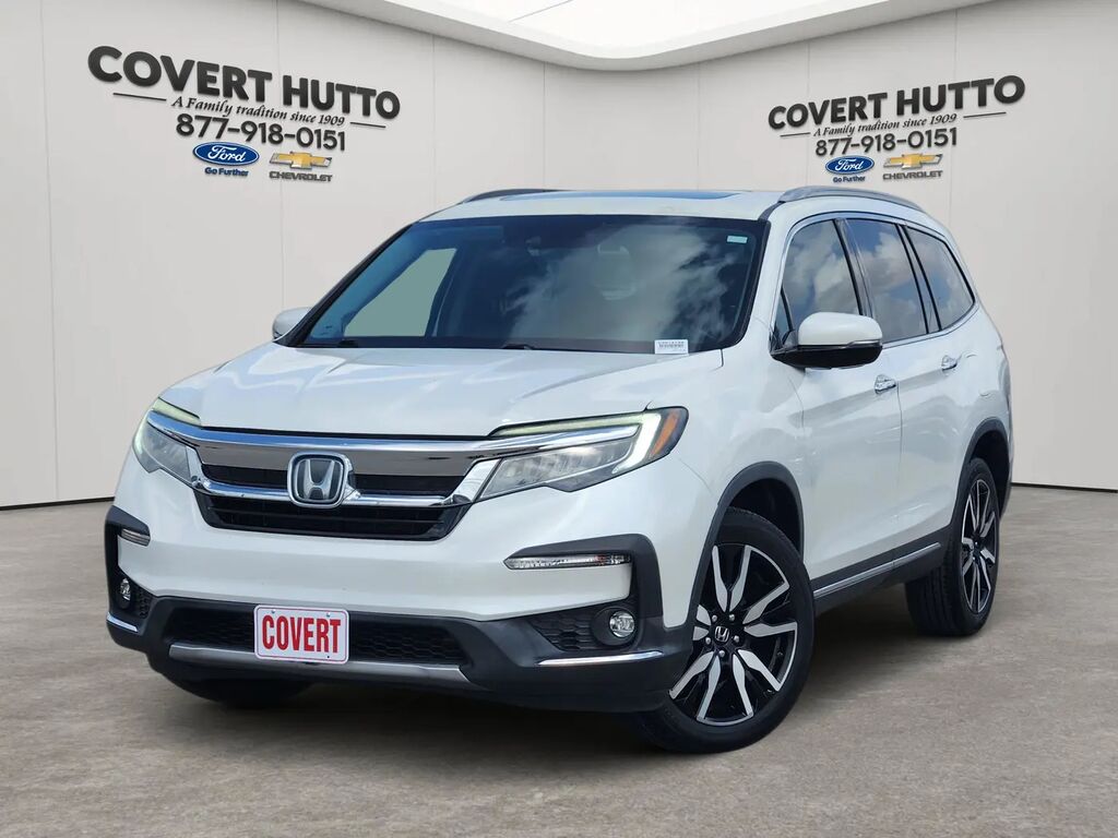 2021 Honda Pilot Touring w/Rear Captain's Chairs — photo 1 of 13