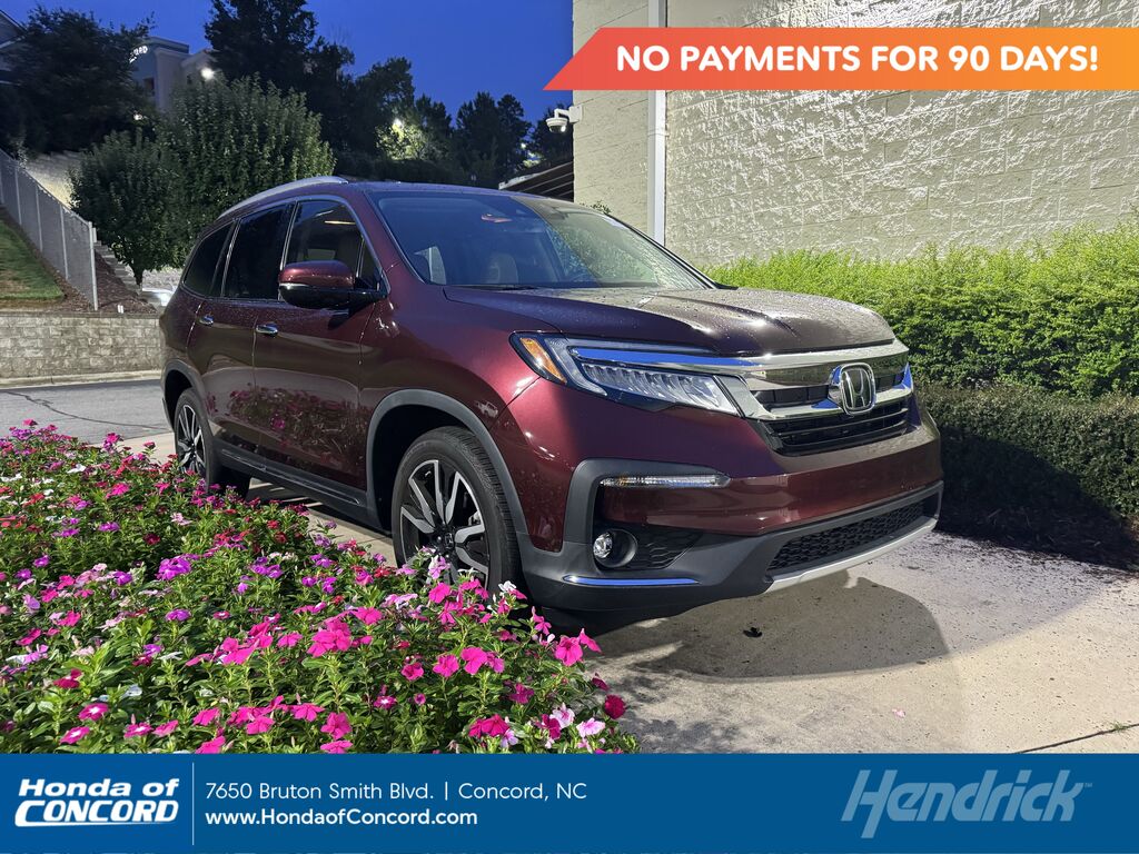 2022 Honda Pilot AWD TRG 7P — photo 1 of 7