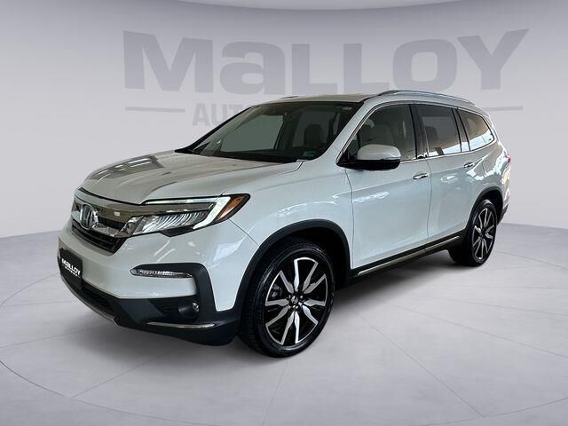 2021 Honda Pilot Touring w/Rear Captain's Chairs — photo 1 of 26