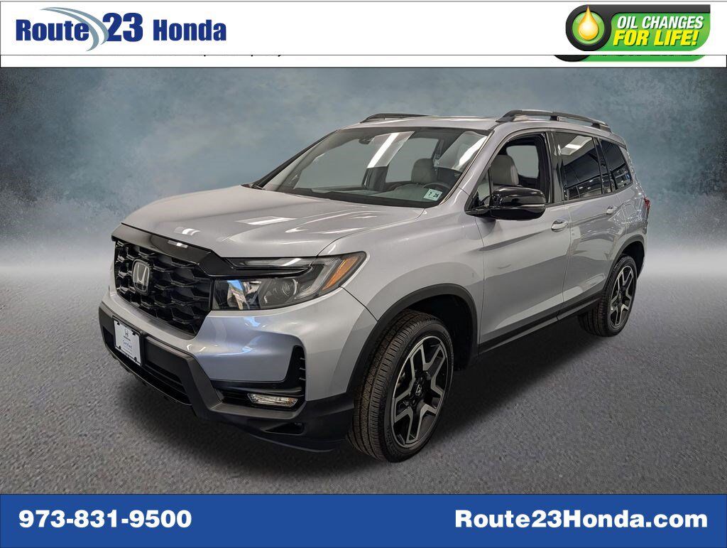 2023 Honda Passport AWD ELITE — photo 1 of 7