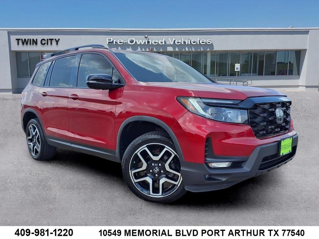 2023 Honda Passport Elite — photo 1 of 14