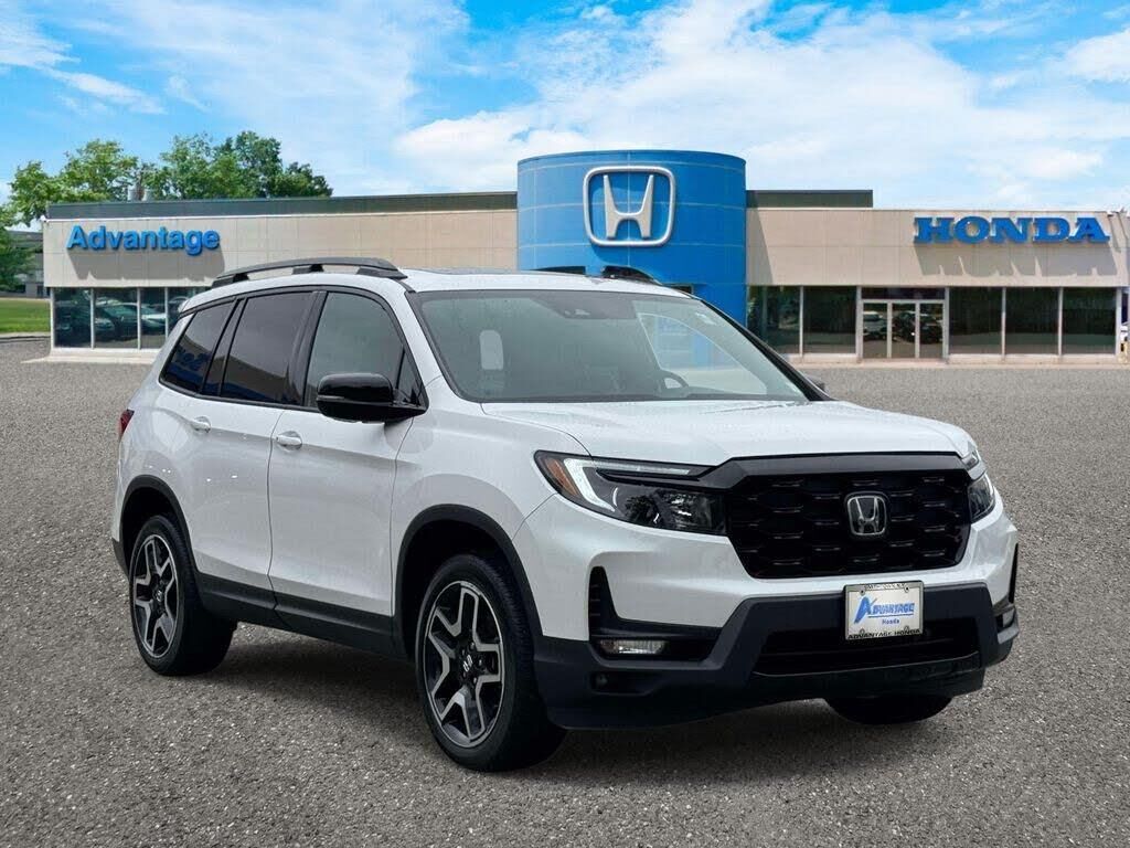 2023 Honda Passport Elite — photo 1 of 14