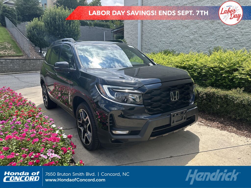 2023 Honda Passport Elite — photo 1 of 14