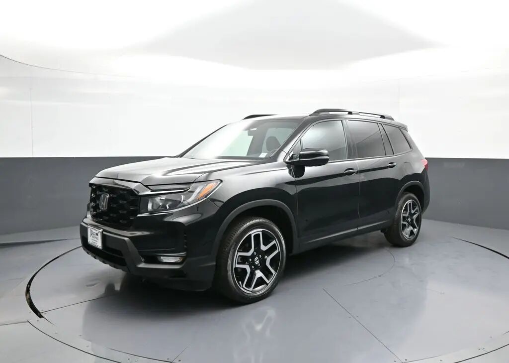 2023 Honda Passport Elite — photo 1 of 12
