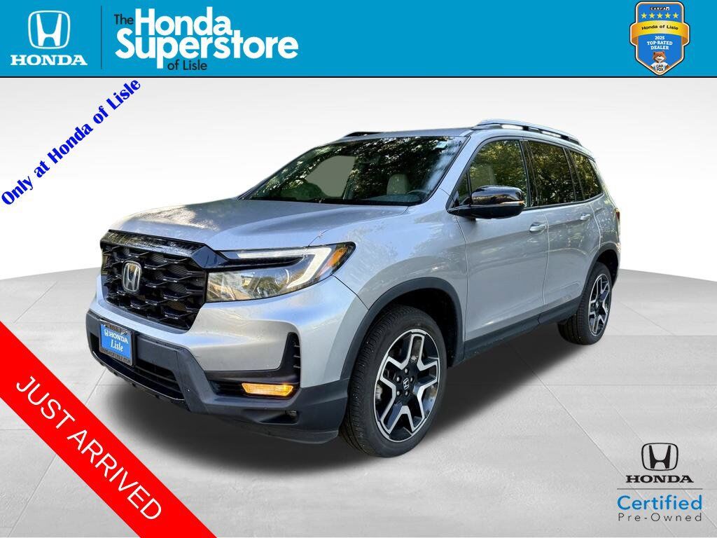 2023 Honda Passport AWD ELITE — photo 1 of 7