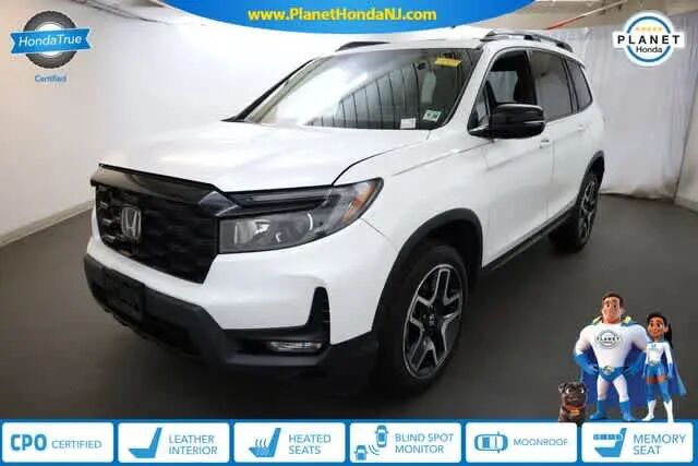 2023 Honda Passport Elite — photo 1 of 13