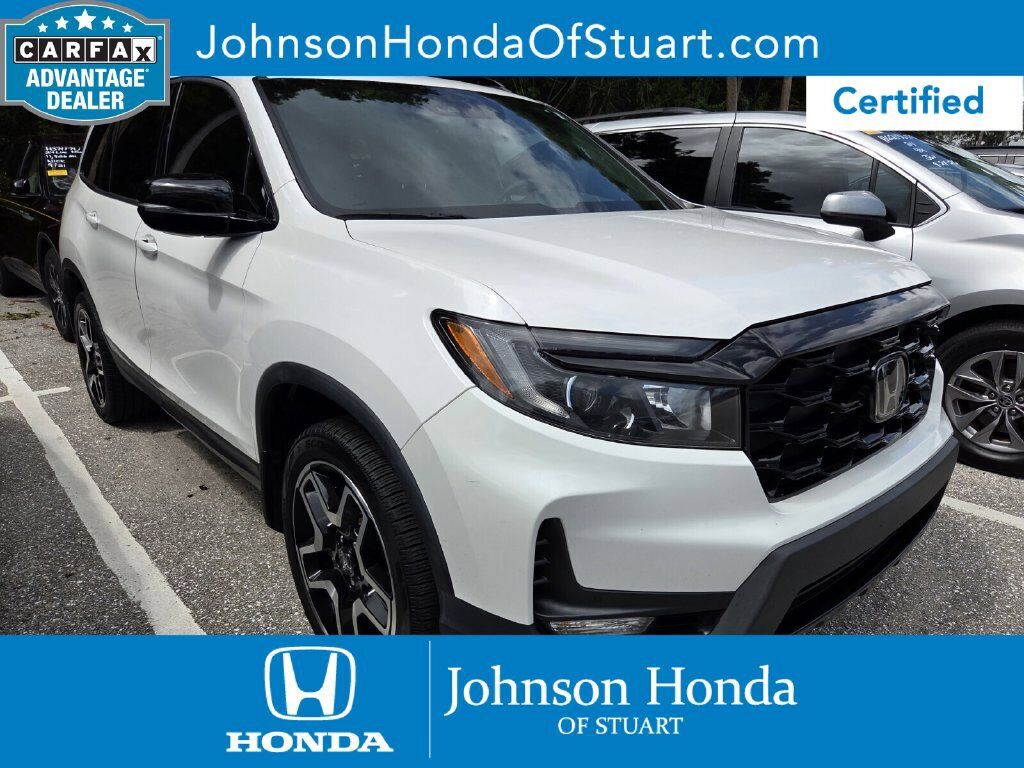 2023 Honda Passport AWD ELITE — photo 1 of 5