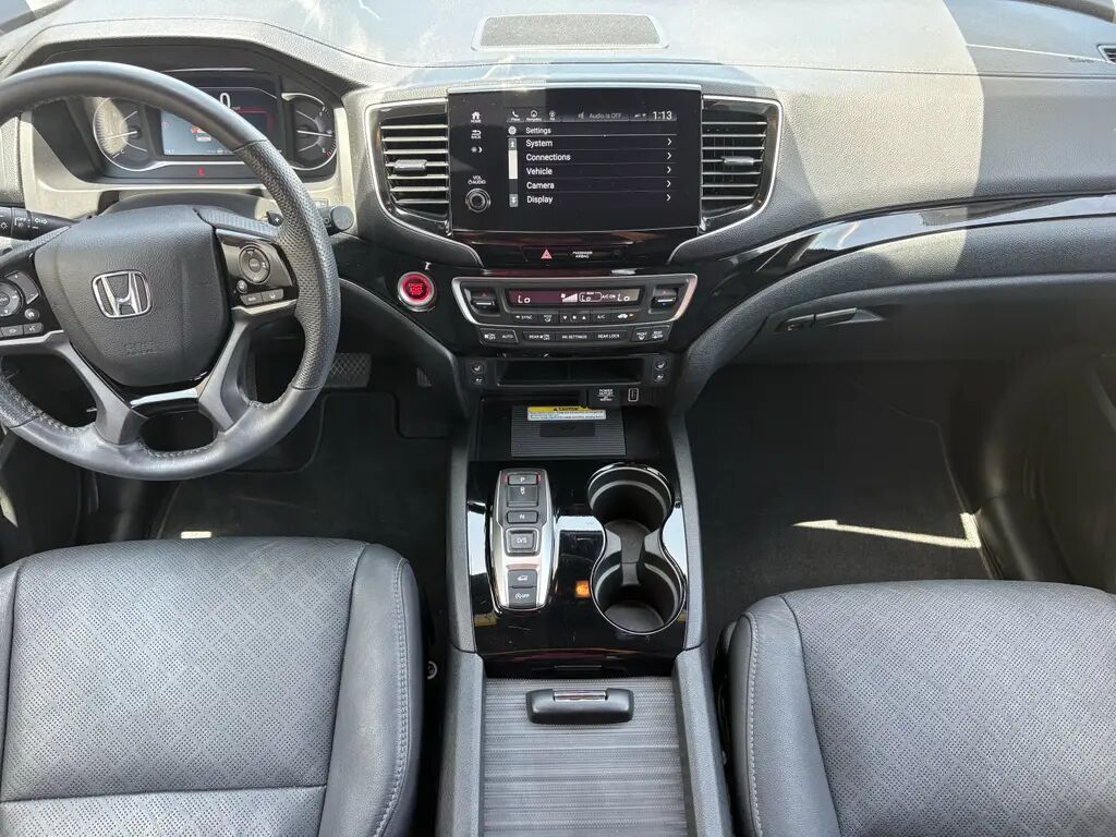 2023 Honda Passport Elite — photo 1 of 26