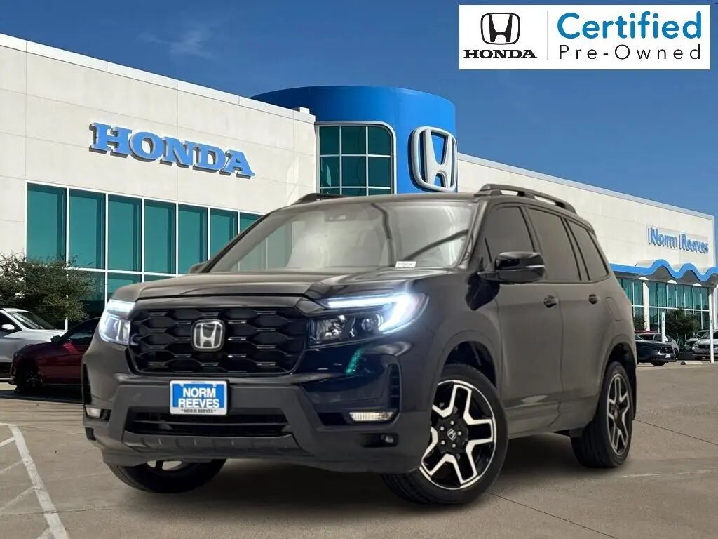 2023 Honda Passport Elite — photo 1 of 13