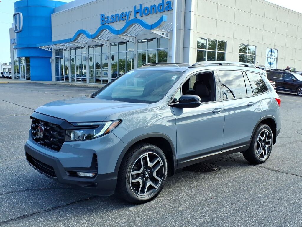 2023 Honda Passport AWD ELITE — photo 1 of 7