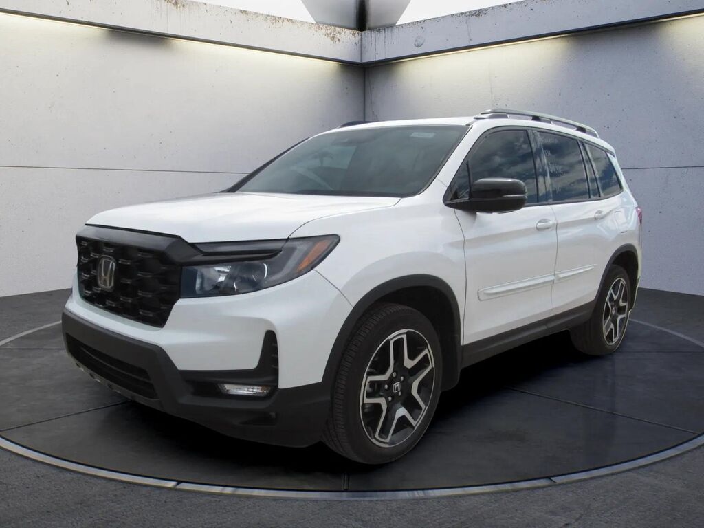 2023 Honda Passport AWD ELITE — photo 1 of 7