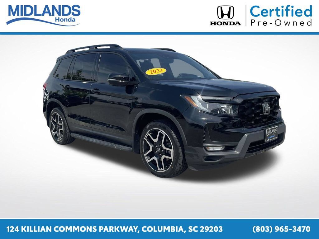 2023 Honda Passport AWD ELITE — photo 1 of 7