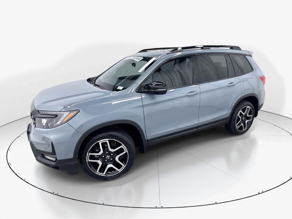 2023 Honda Passport AWD ELITE — photo 1 of 7