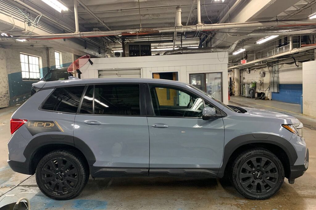 2023 Honda Passport AWD EX-L — photo 1 of 3