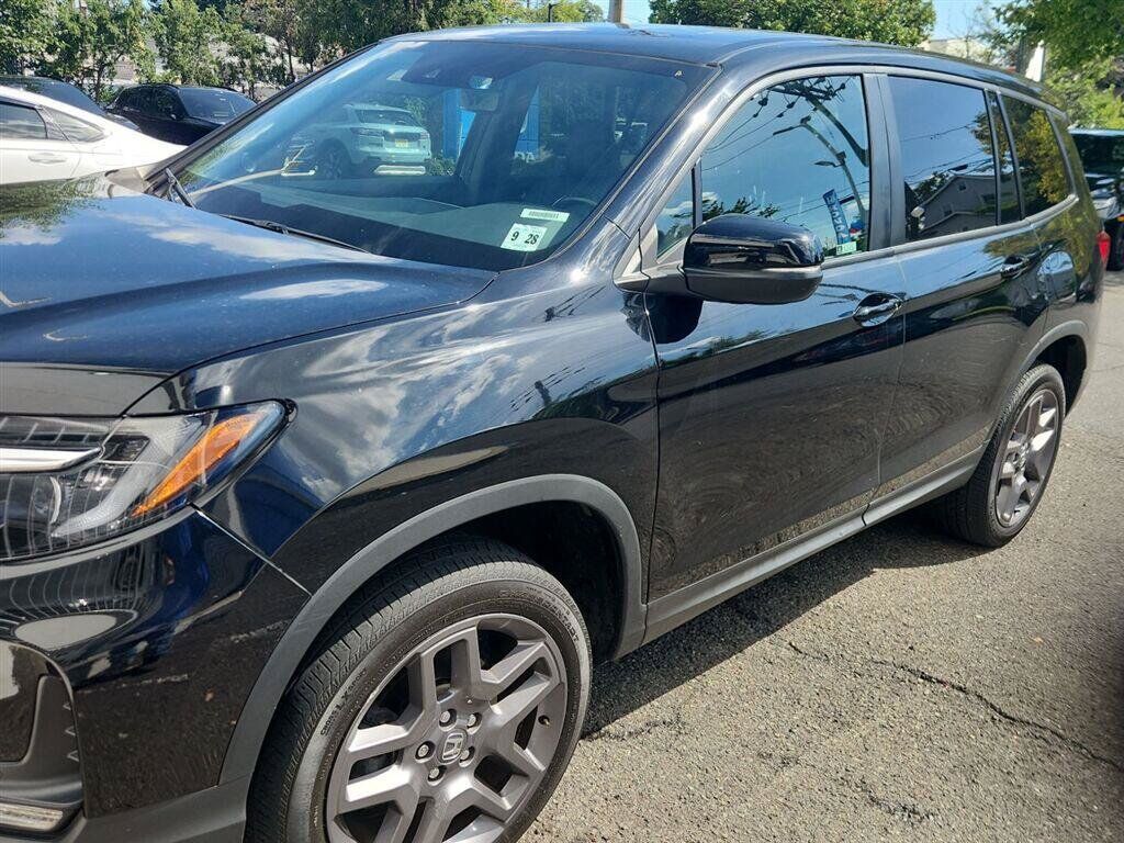 2023 Honda Passport AWD EX-L — photo 1 of 7