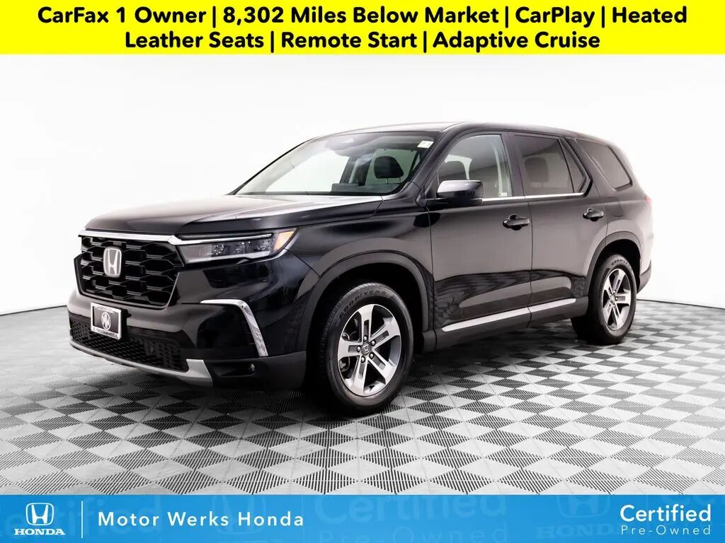 2023 Honda Pilot EX-L w/Rear Captain's Chairs — photo 1 of 12