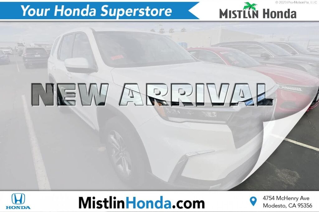 2023 Honda Pilot EX-L w/Rear Captain's Chairs — photo 1 of 25