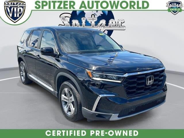 2023 Honda Pilot EX-L w/Rear Captain's Chairs — photo 1 of 7
