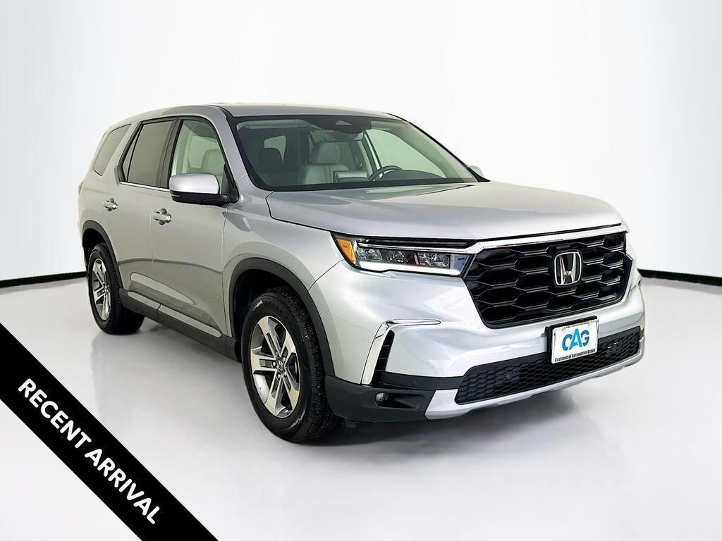 2024 Honda Pilot EX-L w/Rear Captain's Chairs — photo 1 of 7
