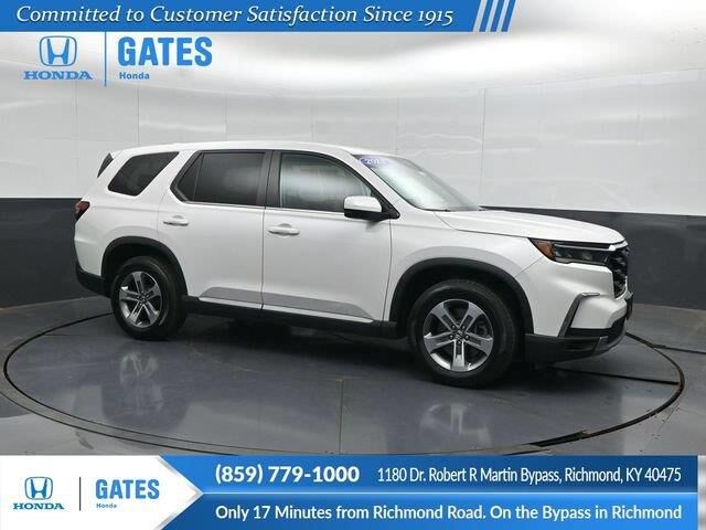 2023 Honda Pilot EX-L w/Rear Captain's Chairs — photo 1 of 13