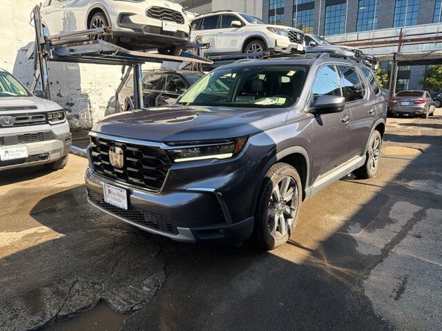 2024 Honda Pilot AWD TRG — photo 1 of 7