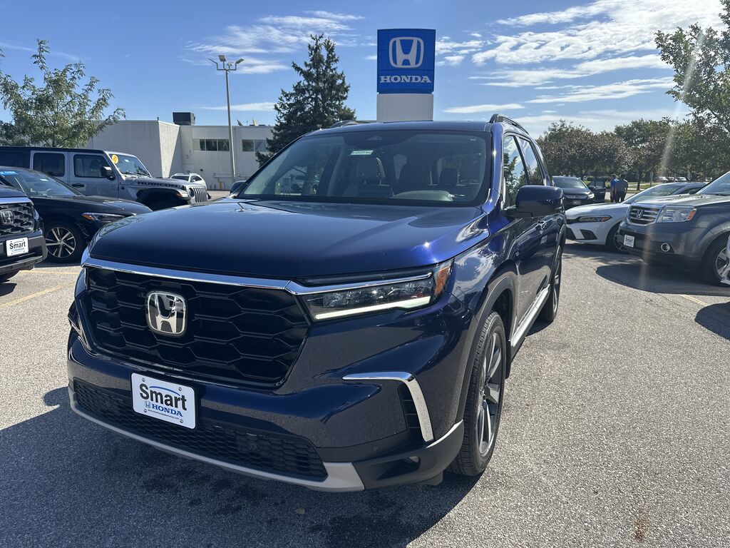 2024 Honda Pilot AWD TRG — photo 1 of 7